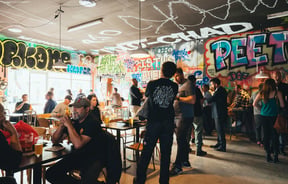 Crowd inside the bar at Abandoned Taproom Petone.