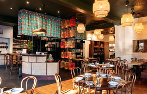 Colourful interior in the dining room at Apache.