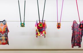Art hangs on display at ArtsPost Gallery and Shop Hamilton.