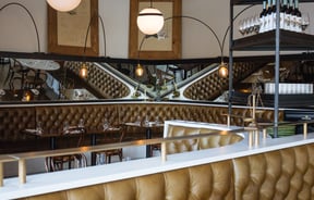 Interior of cafe by mirrors.
