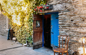 A blue door leading to a bar in Arrowtown.