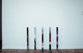 Colourful poles on the floor.