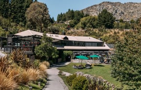 The large exterior of Canyon Brewing Queenstown on a sunny day.