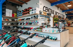 Front counter at Central Bicycle Studio and bikes surrounding it.
