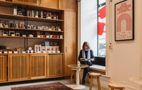 Customer reads a journal at Coffee Supreme Midland Park, Wellington.