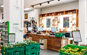 Shop assistant serving customer at front counter at Commonsense on Tory Street in Wellington