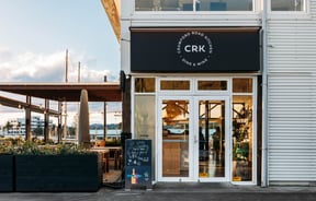 The black and glass exterior of Crawford Road Kitchen Gisborne.