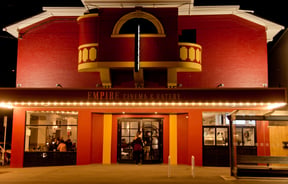 Red and gold exterior of Empire Cinema.