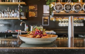 Fried chicken in a bowl on a table.