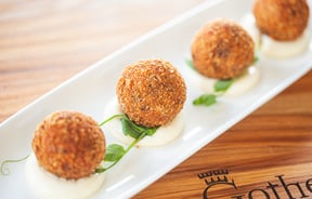Close up of a narrow plate of food.