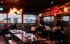 Diners sitting at tables at Haru.