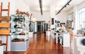 Shelving and display tables with products in LIGHTBOX Gallery & Art Supplies