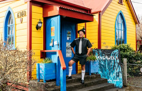 A man posing outside Mangaweka Gallery in Rangitikei.