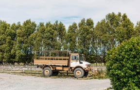 Army style pickup truck outside at MnM Collection in Upper Hutt