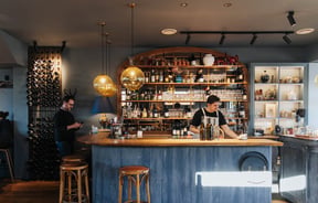 A staff member working at No.7 Balmac.