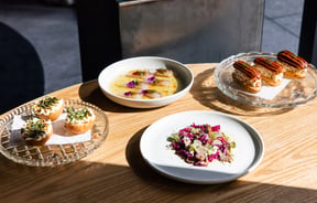 Light hitting a selection of plates on table at Onslow in Auckland