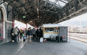 People milling about at the train station.
