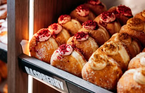 Close up of raspberry donuts at Puku Pies in Petone