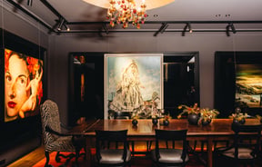 The dark dining room of QT Wellington.