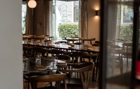 Looking through window into Rata's beautiful dining space