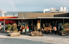 The sunny exterior of Raglan Roast Gisborne.