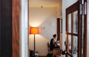 A woman eating in the cafe.