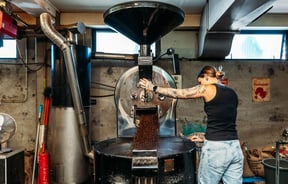 Person roasting coffee at Revive Espresso in Petone