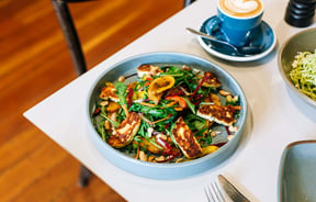 Close up of halloumi salad on a table at Scotts Epicurean.