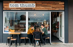 Exterior cafe view of Tom Thumb.