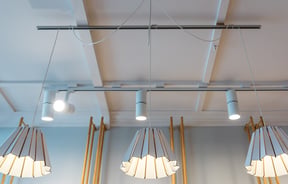 Hanging lights from the ceiling.
