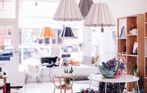 Interior of shop with hanging lights.