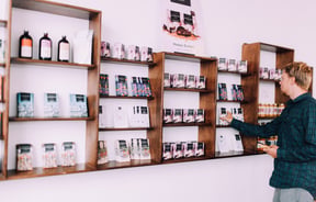 A man picking out chocolate.