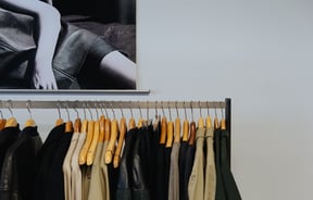 Clothes on a rack.