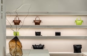 Yu Mei bags on shelves.