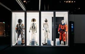 Astronauts in a window.
