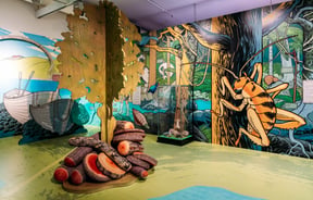 A colourful mural on an interior wall.