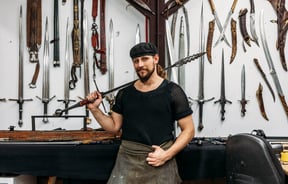 A man holding a sword.