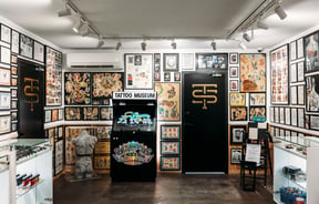 Inside a tattoo studio.