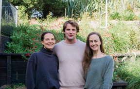 The Tussock Hill management team smiling to camera outside.