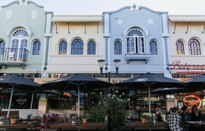 Blue, yellow and green building fronts in Christchurch's new regent street.
