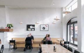 Customers dining inside Hardy St Eatery.
