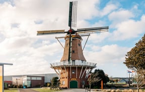 A large windmill building.