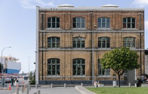 A large brick building on a sunny day at Britomart in Auckland.