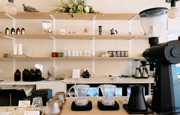 Coffee brewing equipment on the counter at Comes & Goes café in Petone.