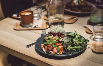 Salad on a table.