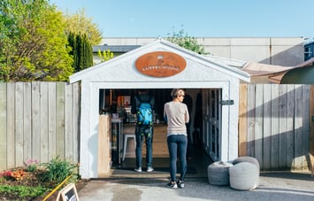 A woman waiting in line at The Coffee Shack.