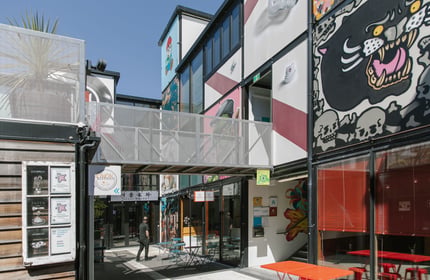 Laneways and an overhead walkway within BOXed Quarter in Christchurch.