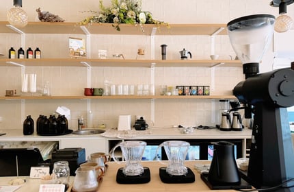 Coffee brewing equipment on the counter at Comes & Goes café in Petone.