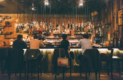 People sitting in the bar.