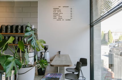 The bench seating next to the counter inside Lux Espresso Christchurch.